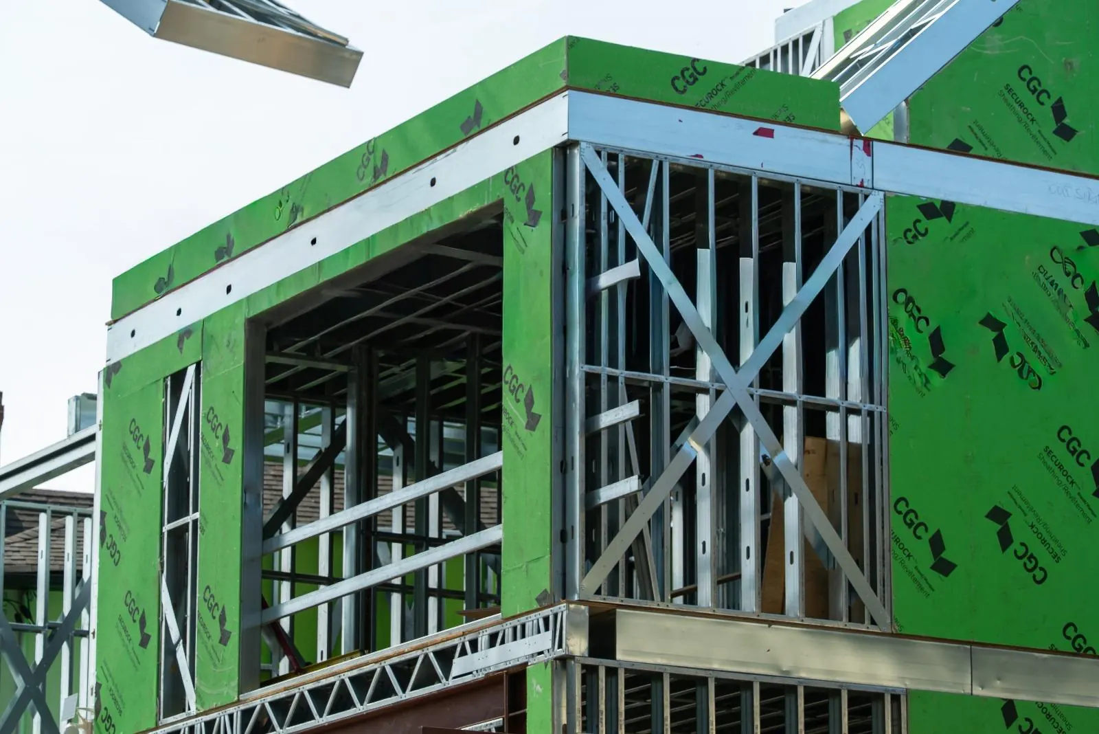 Steel frame and sheathing going up