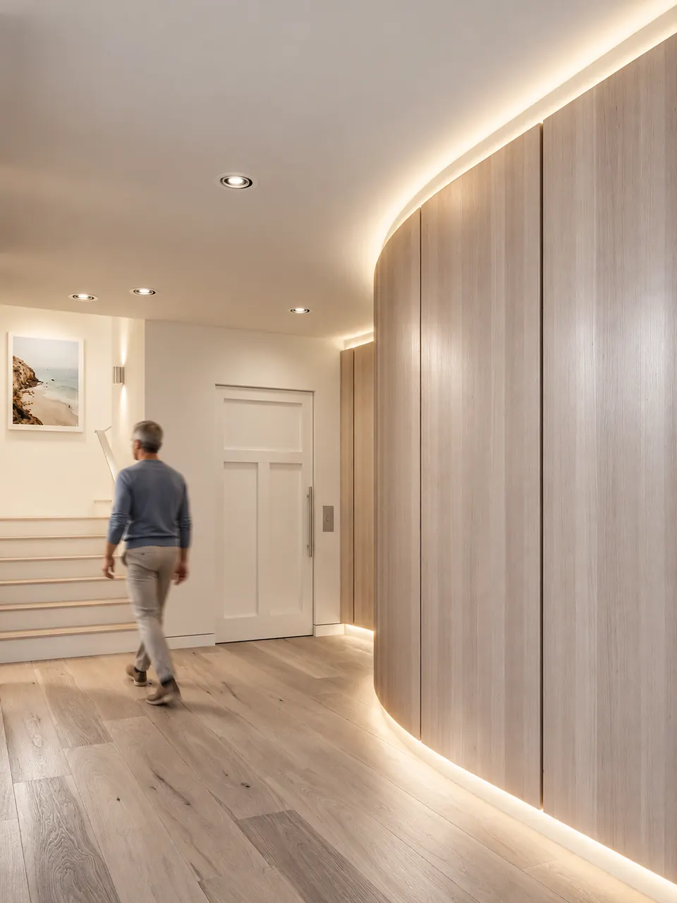 Curved oak-panelled hallway